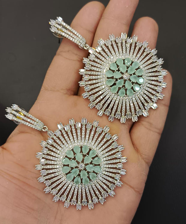 Get Beautiful Round Silver Crystal Earrings